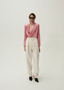 Tapered wool trousers in cream