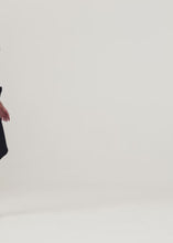 Load and play video in Gallery viewer, Ruched floral appliqué turtleneck in yellow print
